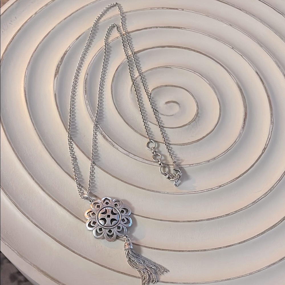 Intricate Silver Necklace with Circular Pendant and Tassel